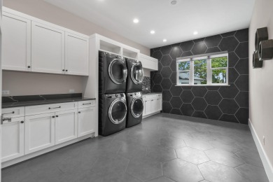 This exquisite residence, designed and built by the prestigious on Medalist Golf Club in Florida - for sale on GolfHomes.com, golf home, golf lot