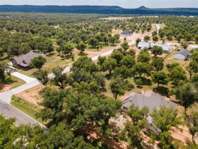 Discover the perfect setting for your dream home on this on Pecan Plantation Country Club in Texas - for sale on GolfHomes.com, golf home, golf lot