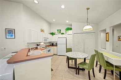 This end-unit residence offers 2 bedrooms plus a den and 2 full on Colonial Country Club in Florida - for sale on GolfHomes.com, golf home, golf lot