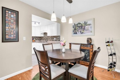 Beautifully updated villa-style condo in Palm Harbor's premier on Highland Lakes Executive Golf Course in Florida - for sale on GolfHomes.com, golf home, golf lot