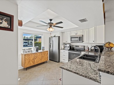 Beautifully remodeled 2-bedroom, 2-bathroom end-unit condominium on Seven Springs Golf and Country Club in Florida - for sale on GolfHomes.com, golf home, golf lot