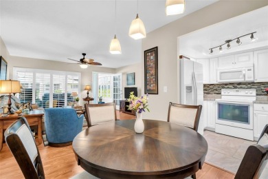 Beautifully updated villa-style condo in Palm Harbor's premier on Highland Lakes Executive Golf Course in Florida - for sale on GolfHomes.com, golf home, golf lot