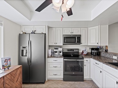 Beautifully remodeled 2-bedroom, 2-bathroom end-unit condominium on Seven Springs Golf and Country Club in Florida - for sale on GolfHomes.com, golf home, golf lot