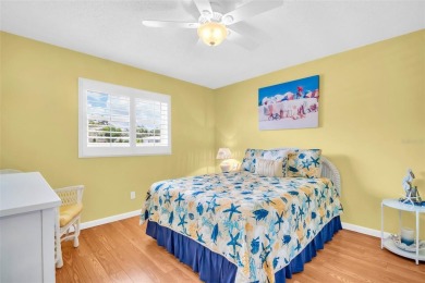 Beautifully updated villa-style condo in Palm Harbor's premier on Highland Lakes Executive Golf Course in Florida - for sale on GolfHomes.com, golf home, golf lot