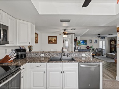 Beautifully remodeled 2-bedroom, 2-bathroom end-unit condominium on Seven Springs Golf and Country Club in Florida - for sale on GolfHomes.com, golf home, golf lot