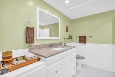 Beautifully updated villa-style condo in Palm Harbor's premier on Highland Lakes Executive Golf Course in Florida - for sale on GolfHomes.com, golf home, golf lot