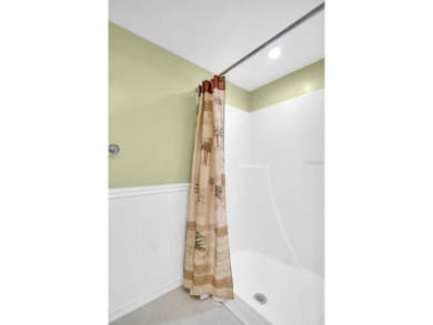 Beautifully updated villa-style condo in Palm Harbor's premier on Highland Lakes Executive Golf Course in Florida - for sale on GolfHomes.com, golf home, golf lot