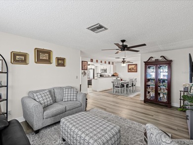 Beautifully remodeled 2-bedroom, 2-bathroom end-unit condominium on Seven Springs Golf and Country Club in Florida - for sale on GolfHomes.com, golf home, golf lot