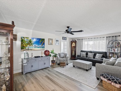 Beautifully remodeled 2-bedroom, 2-bathroom end-unit condominium on Seven Springs Golf and Country Club in Florida - for sale on GolfHomes.com, golf home, golf lot