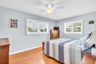 Beautifully updated villa-style condo in Palm Harbor's premier on Highland Lakes Executive Golf Course in Florida - for sale on GolfHomes.com, golf home, golf lot