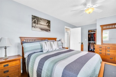 Beautifully updated villa-style condo in Palm Harbor's premier on Highland Lakes Executive Golf Course in Florida - for sale on GolfHomes.com, golf home, golf lot
