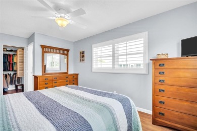 Beautifully updated villa-style condo in Palm Harbor's premier on Highland Lakes Executive Golf Course in Florida - for sale on GolfHomes.com, golf home, golf lot