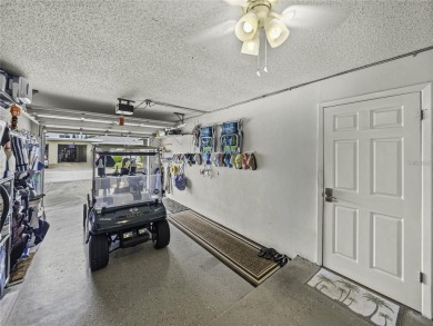 Beautifully updated villa-style condo in Palm Harbor's premier on Highland Lakes Executive Golf Course in Florida - for sale on GolfHomes.com, golf home, golf lot