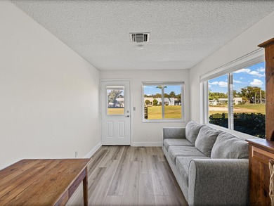 Beautifully remodeled 2-bedroom, 2-bathroom end-unit condominium on Seven Springs Golf and Country Club in Florida - for sale on GolfHomes.com, golf home, golf lot