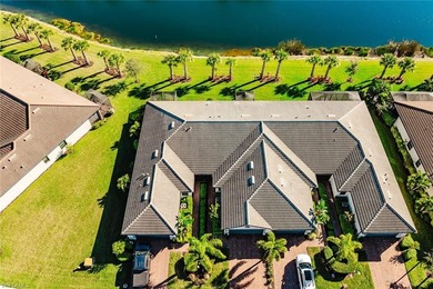 Enjoy expansive, tranquil water and golf course views that you on Panther Run Golf Club in Florida - for sale on GolfHomes.com, golf home, golf lot