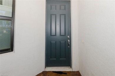 Enjoy expansive, tranquil water and golf course views that you on Panther Run Golf Club in Florida - for sale on GolfHomes.com, golf home, golf lot