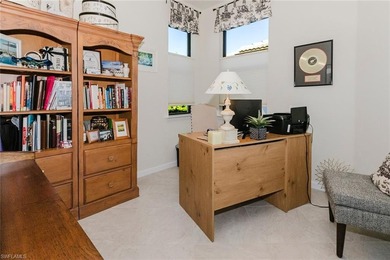 Enjoy expansive, tranquil water and golf course views that you on Panther Run Golf Club in Florida - for sale on GolfHomes.com, golf home, golf lot