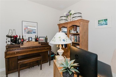 Enjoy expansive, tranquil water and golf course views that you on Panther Run Golf Club in Florida - for sale on GolfHomes.com, golf home, golf lot