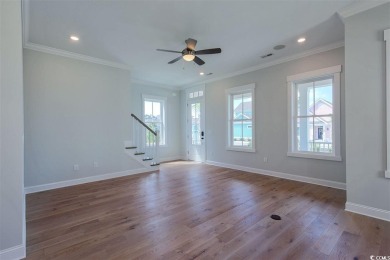 At 2,196 heated sqft, the two story Cooper home located on lot on The Dunes Golf and Beach Club in South Carolina - for sale on GolfHomes.com, golf home, golf lot
