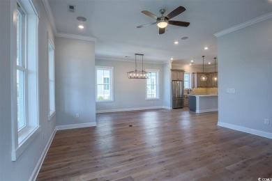 At 2,196 heated sqft, the two story Cooper home located on lot on The Dunes Golf and Beach Club in South Carolina - for sale on GolfHomes.com, golf home, golf lot