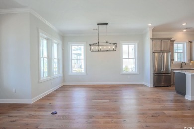 At 2,196 heated sqft, the two story Cooper home located on lot on The Dunes Golf and Beach Club in South Carolina - for sale on GolfHomes.com, golf home, golf lot