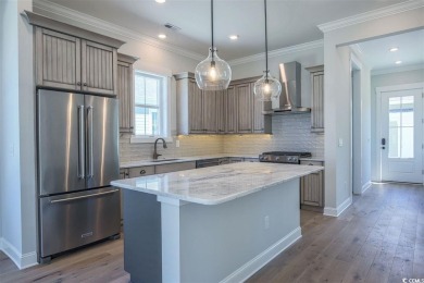 At 2,196 heated sqft, the two story Cooper home located on lot on The Dunes Golf and Beach Club in South Carolina - for sale on GolfHomes.com, golf home, golf lot