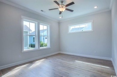 At 2,196 heated sqft, the two story Cooper home located on lot on The Dunes Golf and Beach Club in South Carolina - for sale on GolfHomes.com, golf home, golf lot