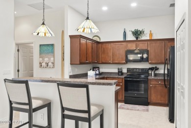 Located in the tranquil golf community of Plantation Bay, this on Plantation Bay Golf and Country Club in Florida - for sale on GolfHomes.com, golf home, golf lot