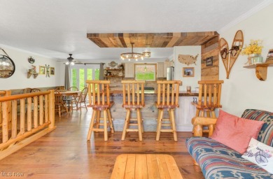 This beautifully updated raised ranch home is a true gem at Lake on Lake Mohawk Golf Club in Ohio - for sale on GolfHomes.com, golf home, golf lot