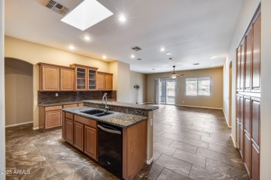 Wake up to lakefront views and luxury living every day! This on Southern Ridge Golf Club in Arizona - for sale on GolfHomes.com, golf home, golf lot