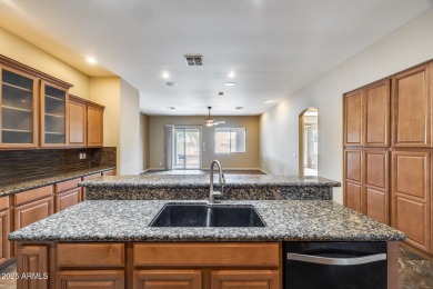 Wake up to lakefront views and luxury living every day! This on Southern Ridge Golf Club in Arizona - for sale on GolfHomes.com, golf home, golf lot