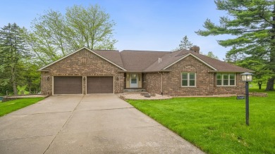 Beautiful all brick ranch home, nestled on the 15th hole in The on Ledges Golf Course in Illinois - for sale on GolfHomes.com, golf home, golf lot