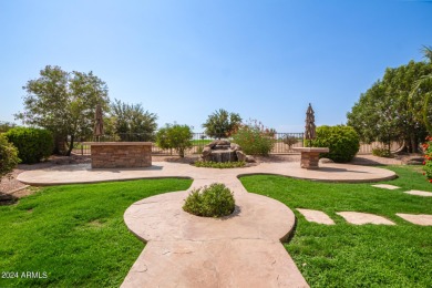 This 2 bedroom 2.5 bathroom home is located right in the heart on Seville Golf and Country Club in Arizona - for sale on GolfHomes.com, golf home, golf lot