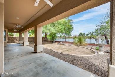 Wake up to lakefront views and luxury living every day! This on Southern Ridge Golf Club in Arizona - for sale on GolfHomes.com, golf home, golf lot