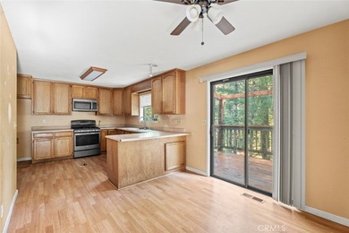 This inviting 3-bedroom, 2.5-bath home offers rare privacy with on Brooktrails Golf Course in California - for sale on GolfHomes.com, golf home, golf lot