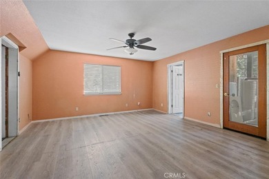 This inviting 3-bedroom, 2.5-bath home offers rare privacy with on Brooktrails Golf Course in California - for sale on GolfHomes.com, golf home, golf lot