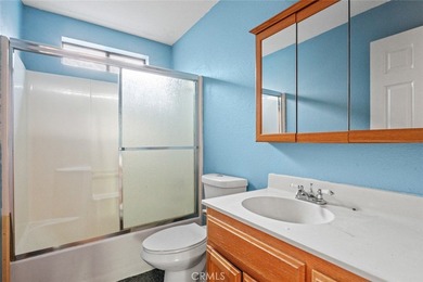 This inviting 3-bedroom, 2.5-bath home offers rare privacy with on Brooktrails Golf Course in California - for sale on GolfHomes.com, golf home, golf lot