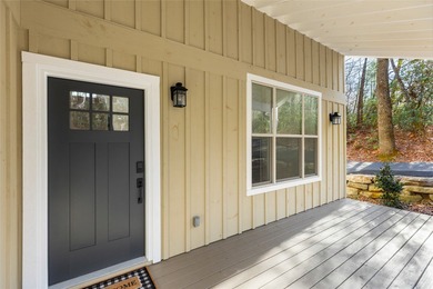 Nestled in the Holly Forest community of Sapphire, North on Sapphire National Golf Club in North Carolina - for sale on GolfHomes.com, golf home, golf lot