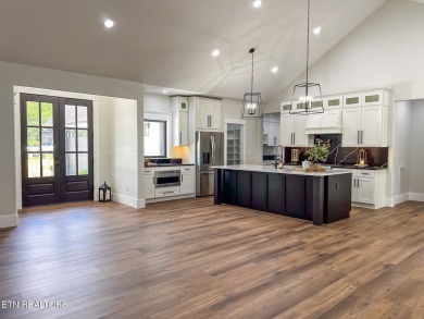 Welcome to 205 Inagehi Trace, a custom-built masterpiece in the on Tellico Village Golf Club in Tennessee - for sale on GolfHomes.com, golf home, golf lot