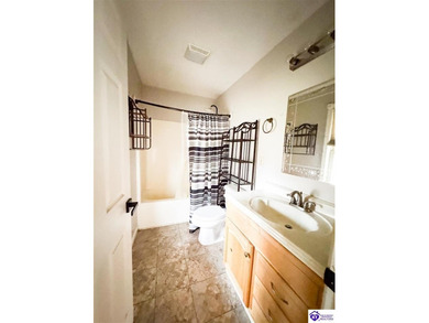 Highly motivated seller -- bring us an offer! AS IS Located in on Doe Valley Country Club in Kentucky - for sale on GolfHomes.com, golf home, golf lot