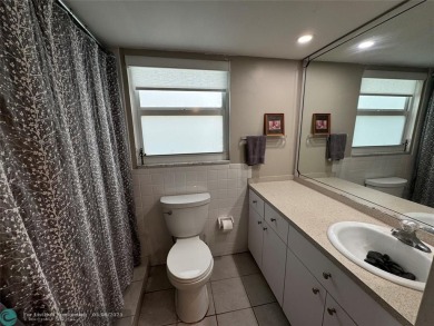 OWNER FINANCING AVAILABLE... EV ELECTRIC CHARGER  installed in on Palm-Aire Country Club and Resort - Palms in Florida - for sale on GolfHomes.com, golf home, golf lot