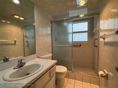 OWNER FINANCING AVAILABLE... EV ELECTRIC CHARGER  installed in on Palm-Aire Country Club and Resort - Palms in Florida - for sale on GolfHomes.com, golf home, golf lot
