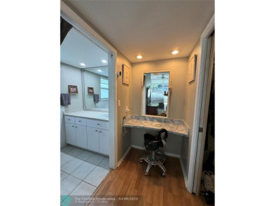 OWNER FINANCING AVAILABLE... EV ELECTRIC CHARGER  installed in on Palm-Aire Country Club and Resort - Palms in Florida - for sale on GolfHomes.com, golf home, golf lot