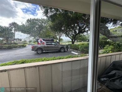 OWNER FINANCING AVAILABLE... EV ELECTRIC CHARGER  installed in on Palm-Aire Country Club and Resort - Palms in Florida - for sale on GolfHomes.com, golf home, golf lot