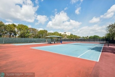 OWNER FINANCING AVAILABLE... EV ELECTRIC CHARGER  installed in on Palm-Aire Country Club and Resort - Palms in Florida - for sale on GolfHomes.com, golf home, golf lot