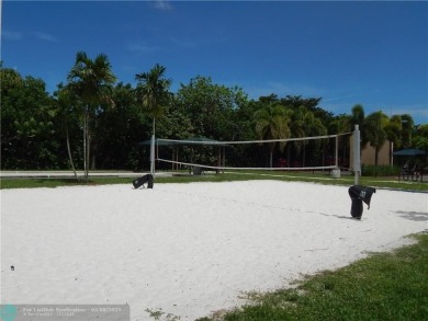 OWNER FINANCING AVAILABLE... EV ELECTRIC CHARGER  installed in on Palm-Aire Country Club and Resort - Palms in Florida - for sale on GolfHomes.com, golf home, golf lot