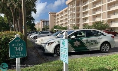 OWNER FINANCING AVAILABLE... EV ELECTRIC CHARGER  installed in on Palm-Aire Country Club and Resort - Palms in Florida - for sale on GolfHomes.com, golf home, golf lot