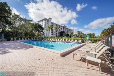 OWNER FINANCING AVAILABLE... EV ELECTRIC CHARGER  installed in on Palm-Aire Country Club and Resort - Palms in Florida - for sale on GolfHomes.com, golf home, golf lot
