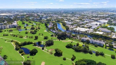 OWNER FINANCING AVAILABLE... EV ELECTRIC CHARGER  installed in on Palm-Aire Country Club and Resort - Palms in Florida - for sale on GolfHomes.com, golf home, golf lot