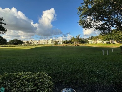 OWNER FINANCING AVAILABLE... EV ELECTRIC CHARGER  installed in on Palm-Aire Country Club and Resort - Palms in Florida - for sale on GolfHomes.com, golf home, golf lot